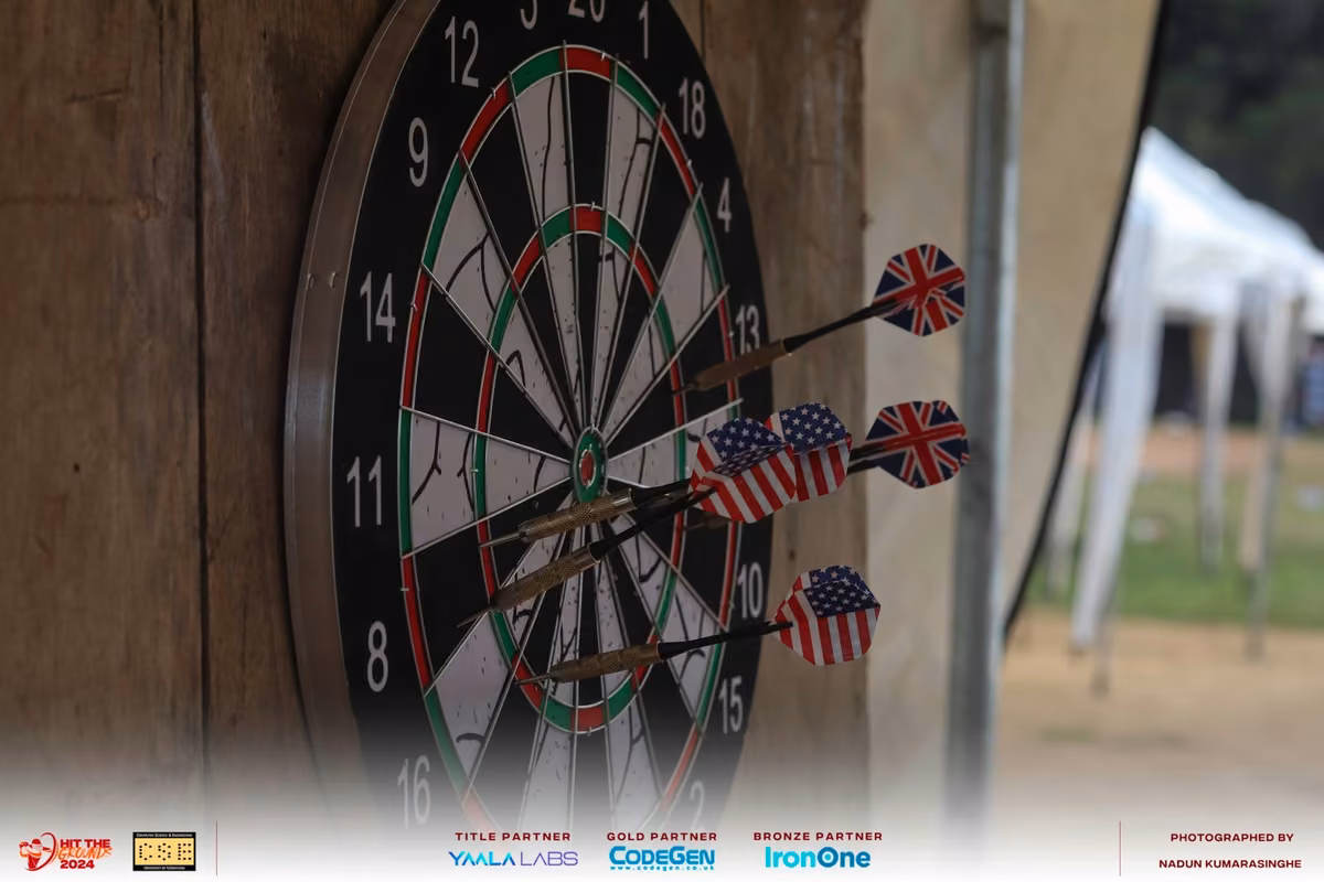 Darts stuck in a dartboard