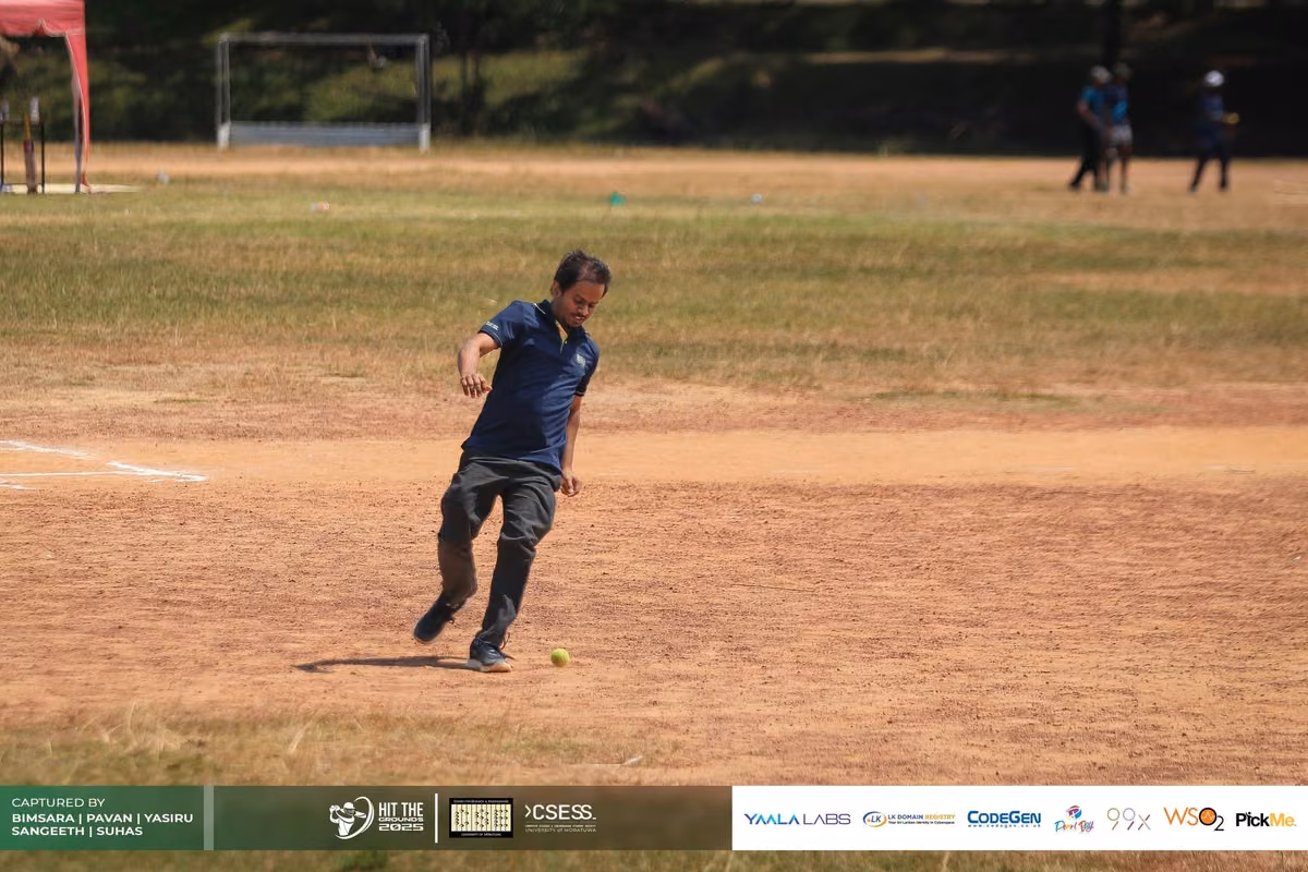 A fielder running in on the ground